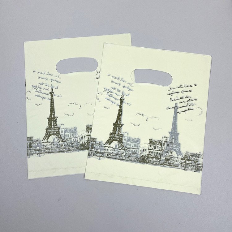 Yiwu Factory Wholesale Four Finger Die-Cutting Shrink Bags for Clothing Store Shopping Plastic Handbag Printing for Rice Use