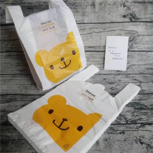 eco-friendly degradable t shirt plastic bag with smail face printing