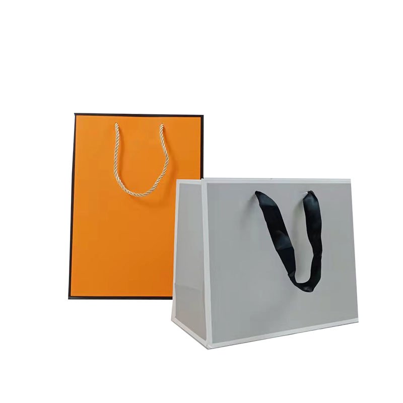 Recyclable custom logo printed paper bag package luxury shopping gift cardboard paper packaging bag with handle