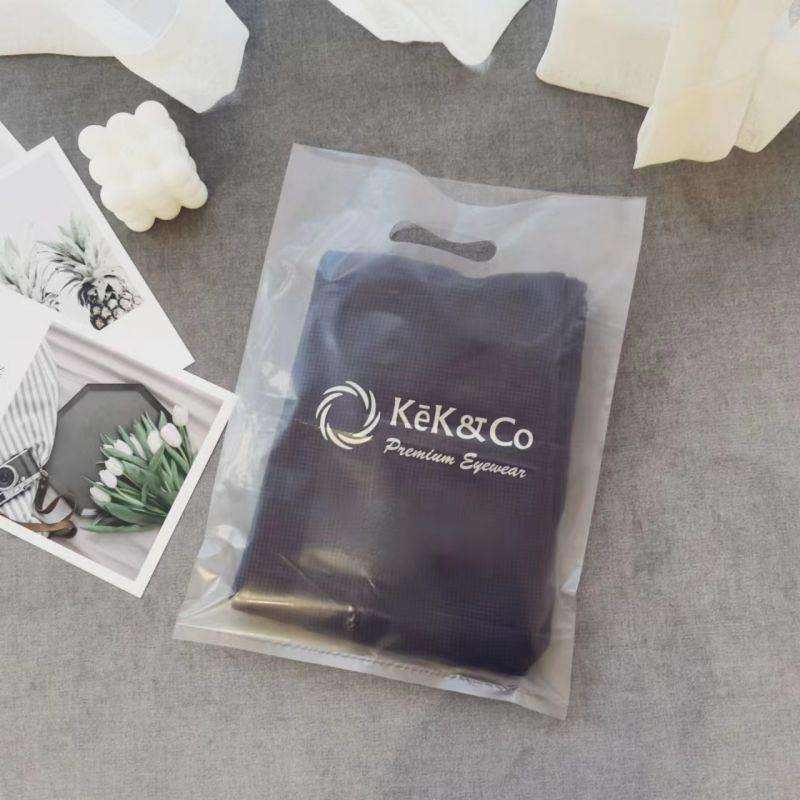 Custom Bags With Logo Plastic Waterproof Cloth Retail Pink Shopping Bag Luxury Printed Die Cut Plastic Shopping Bag With Handle