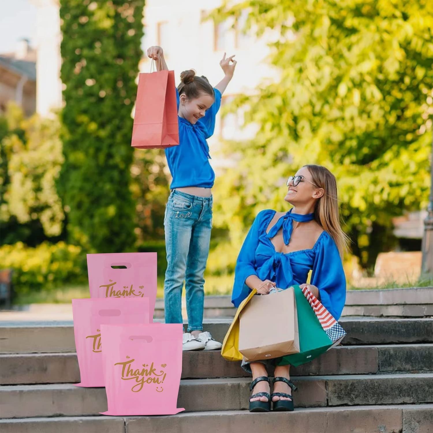 Customized boutique shopping goods gift packaging pink smiley face die-cut handle glossy Carry plastic bag printing
