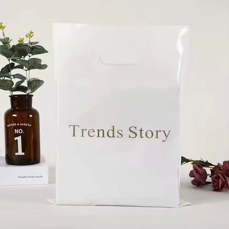 Customized Die-Cut Plastic Shopping Bag with Patch Handle OEM Printed for Cloth Items Packaging Use