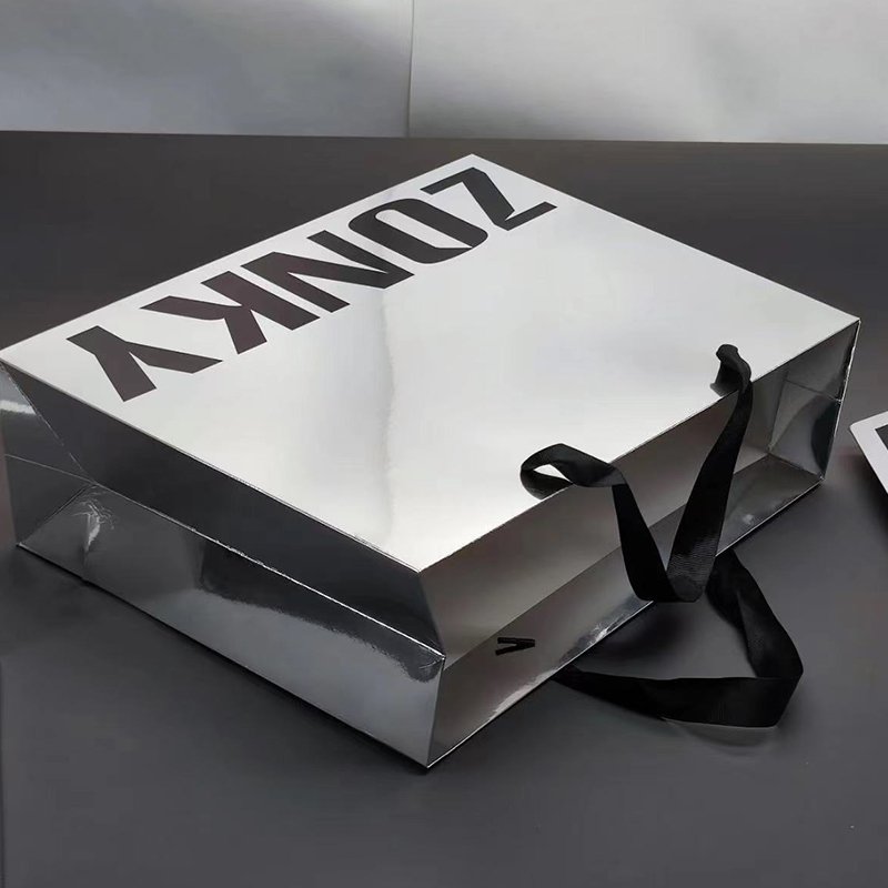 Luxury Silver Reflective Shopping Bags Ribbon Handles Handmade Custom Logo Gift Paper Bags Clothing Boutique Packaging Shoe Use
