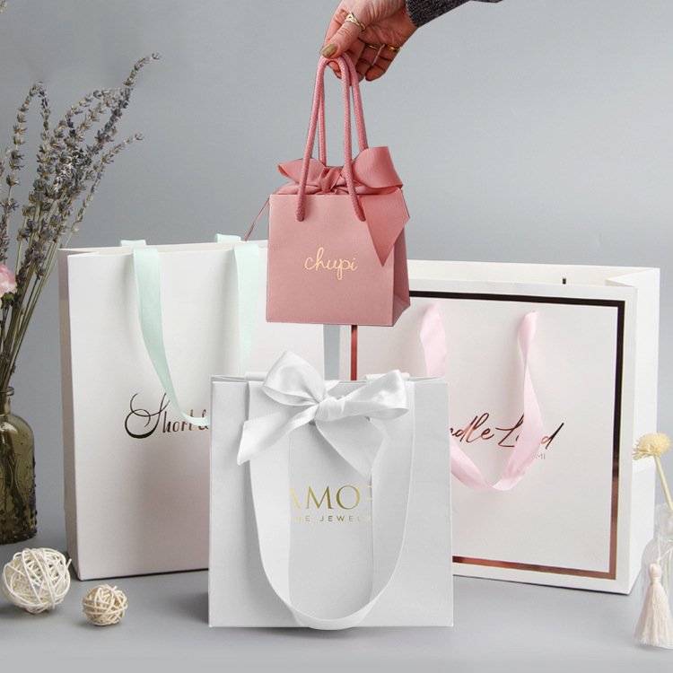 White cardboard custom printed logo eco-friendly clothing tote cheap shopping paper bags for garment