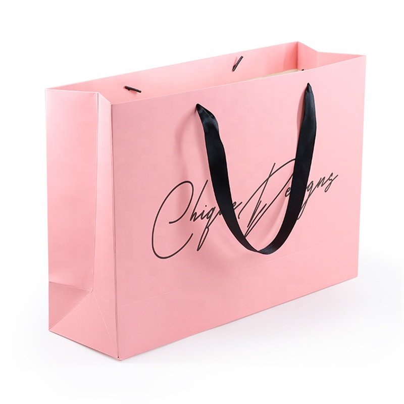 Custom logo printing luxury hot pink fashion shopping paper bag with ribbon handle