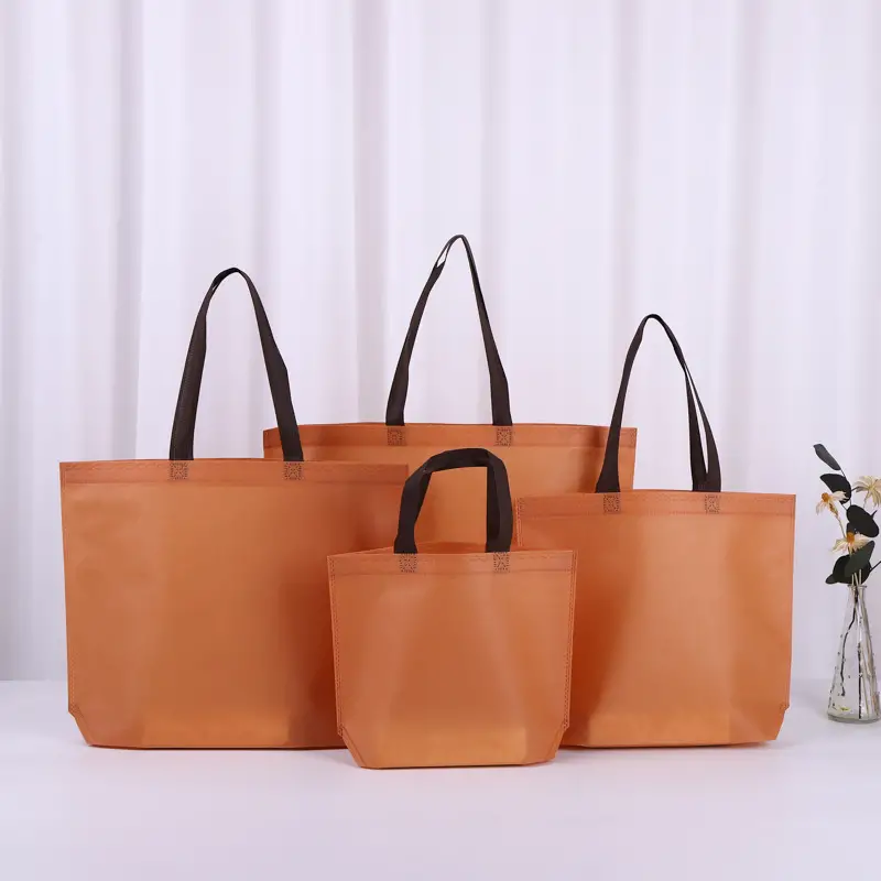 Sichuan huimei eco friendly non woven shopping bags nonwoven handbag tote custom made with logos reusable non woven garment bag
