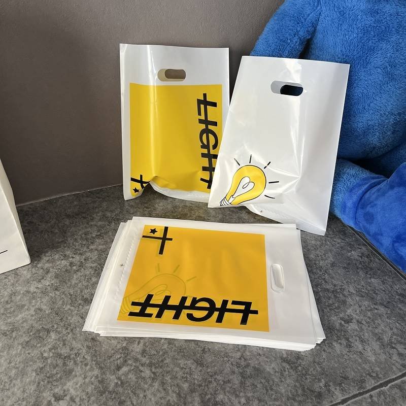 Custom logo plastic Glossy Merchandise Retail Shopping Bags For Small Business clothes shoes with Die Cut Handles Boutique Bags