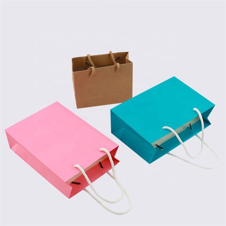 Customized Luxury Kraft Paper Cosmetic Clothing Boutique Gift shopping bags With Your Own Logo