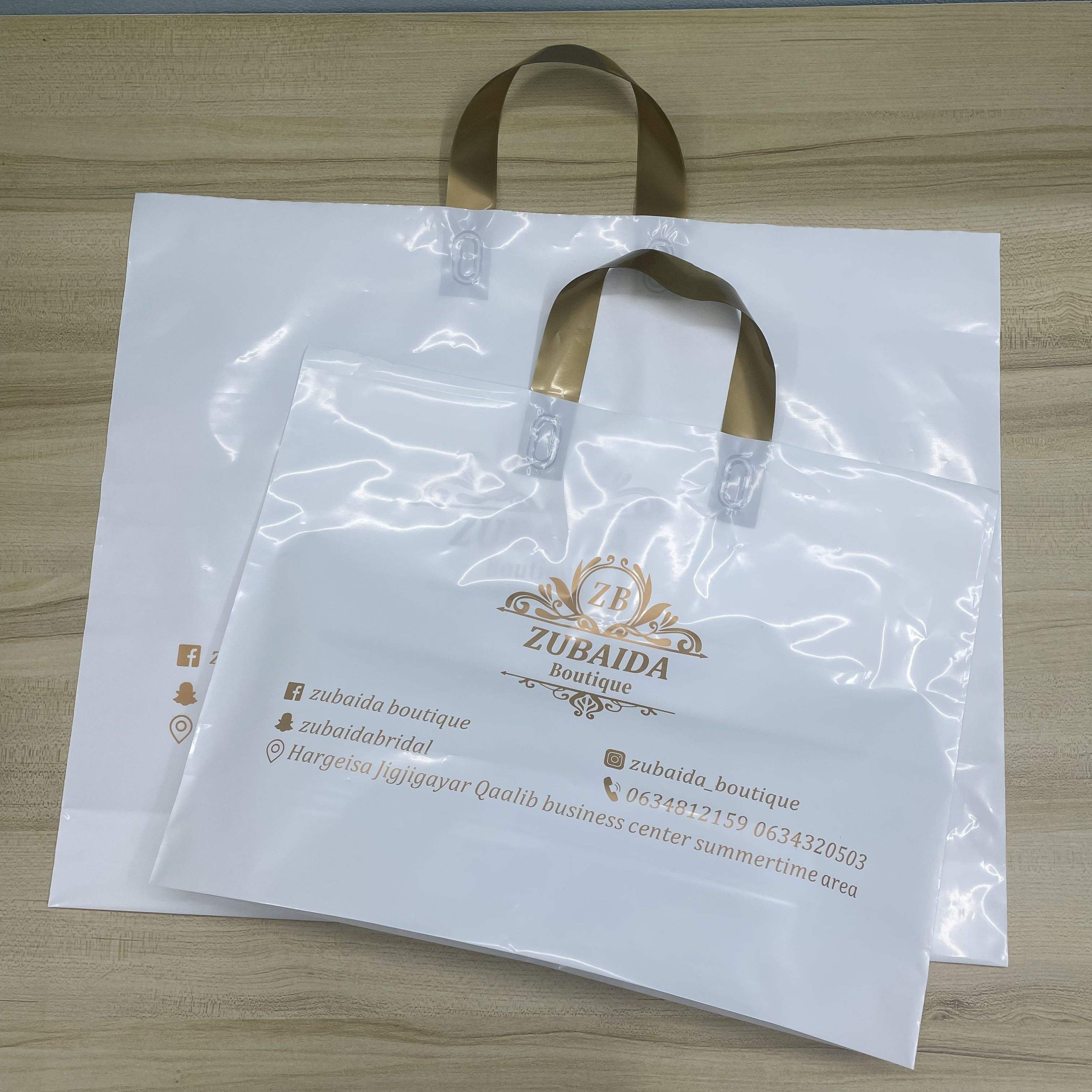 ODM/OEM Custom Design LDPE/HDPE Handle Plastic Bag Die Cut Bag Shopping Bag For Clothing/Shoe Packing