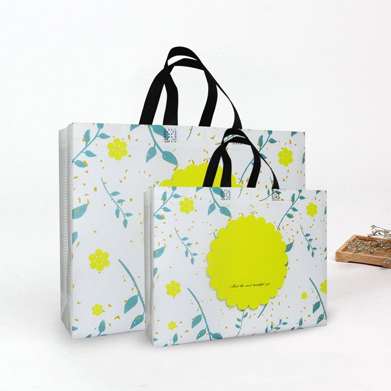 Wholesale low MOQ cheap reusable full print hot press shopping bag laminated non woven tote bags