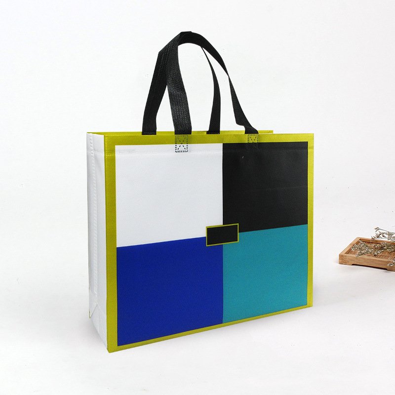 Wholesale low MOQ cheap reusable full print hot press shopping bag laminated non woven tote bags
