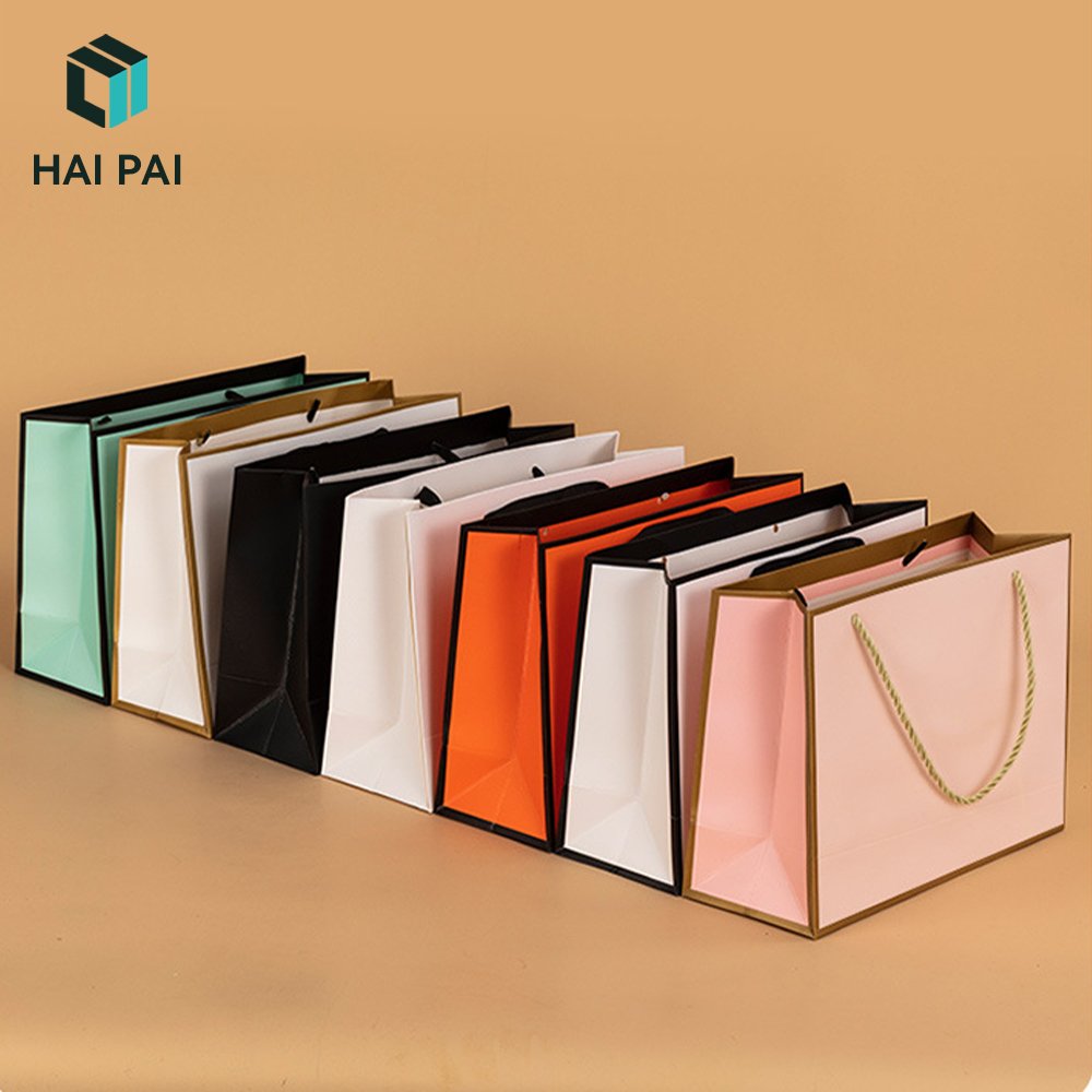 Custom Logo Printed Eco Paper Cloth Garment Perfume Packaging Gift Shopping Bag With Rope Handle