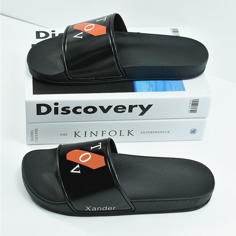The factory wholesale custom black PVC women slides slippers men custom logo slippers
