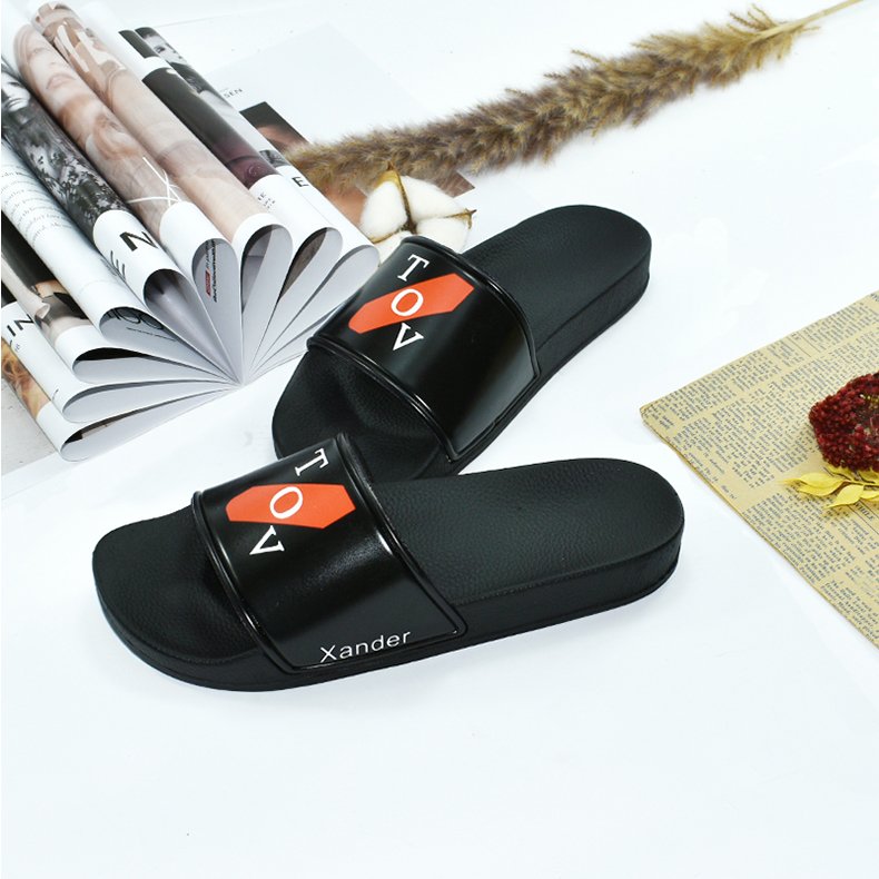 The factory wholesale custom black PVC women slides slippers men custom logo slippers