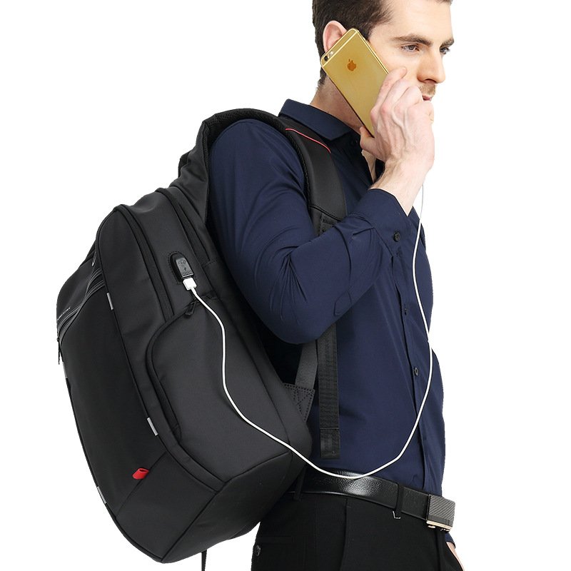 Oem custom kaka luxury man women usb anti theft computer pu genuine leather laptop backpack bags for men