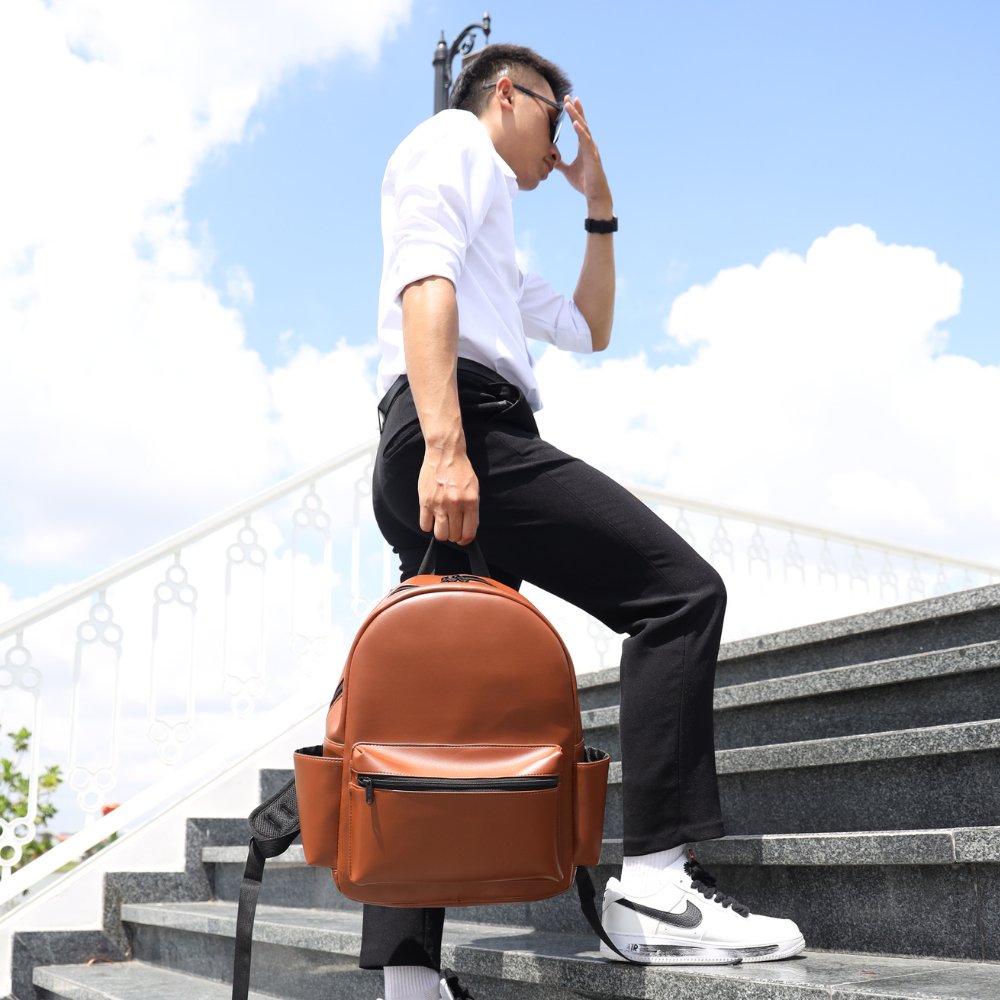 High quality leather school backpack Men's and women's leather backpack made of imported waterproof PU material customized logo