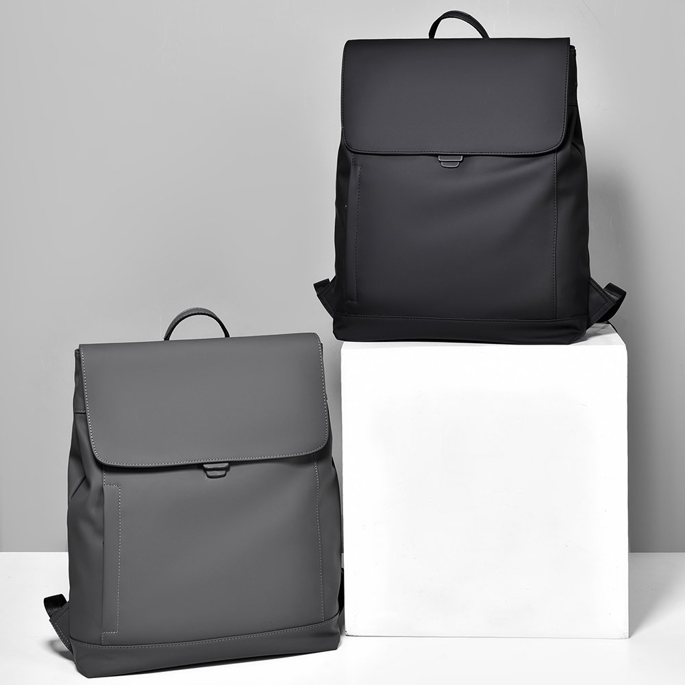 Fashionable hot PU waterproof wear-resistant material laptop bag men's backpack is suitable for daily travel, going out