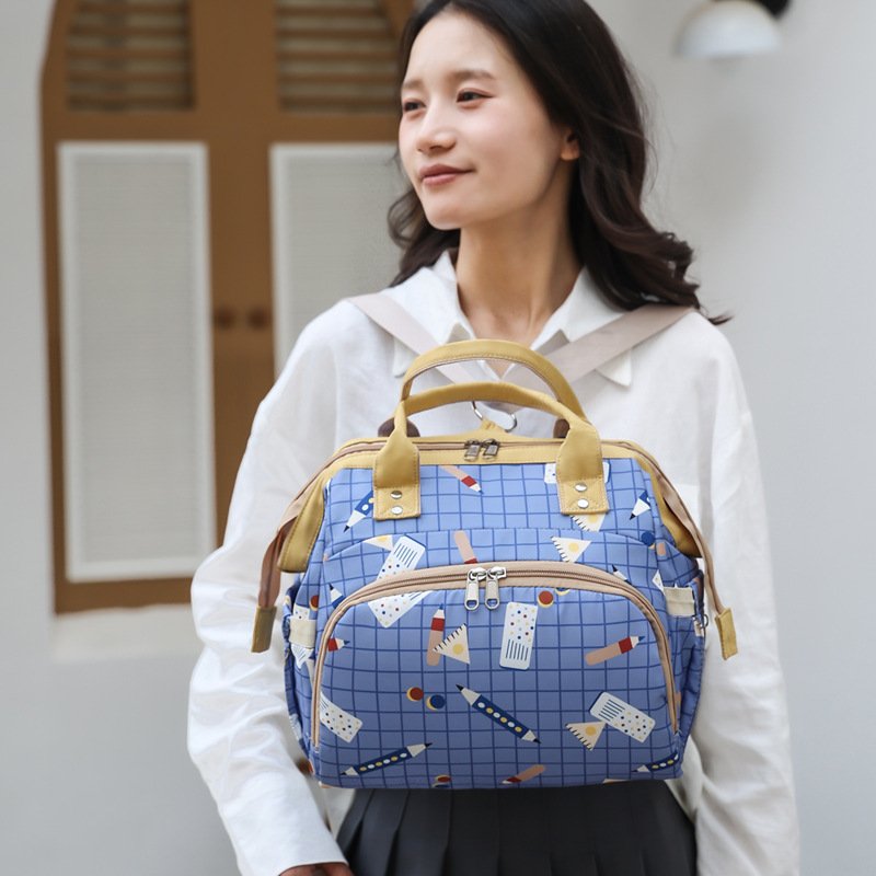 2024 New Design Large Capacity Baby Nappy Bag China Wholesale Portable Mummy Diaper Bag Caddy Fabric Diaper Bag for Mommy