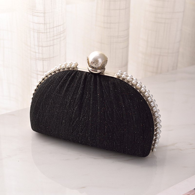 2023 New Dinner Handbag Advanced Sense Of Niche Design Crossbaby bags Shell Shaped Lock Catch evening bags for women