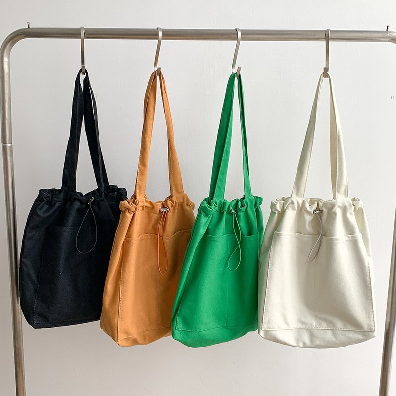 Korean version of the trend ins shoulder bag female casual canvas bag wholesale large capacity fold design Tote bag