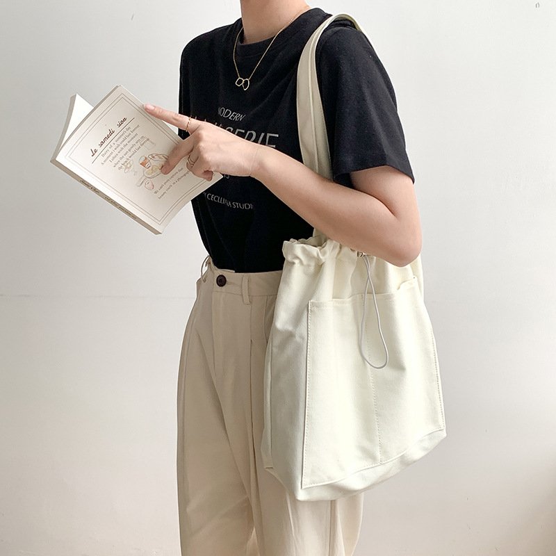 Korean version of the trend ins shoulder bag female casual canvas bag wholesale large capacity fold design Tote bag