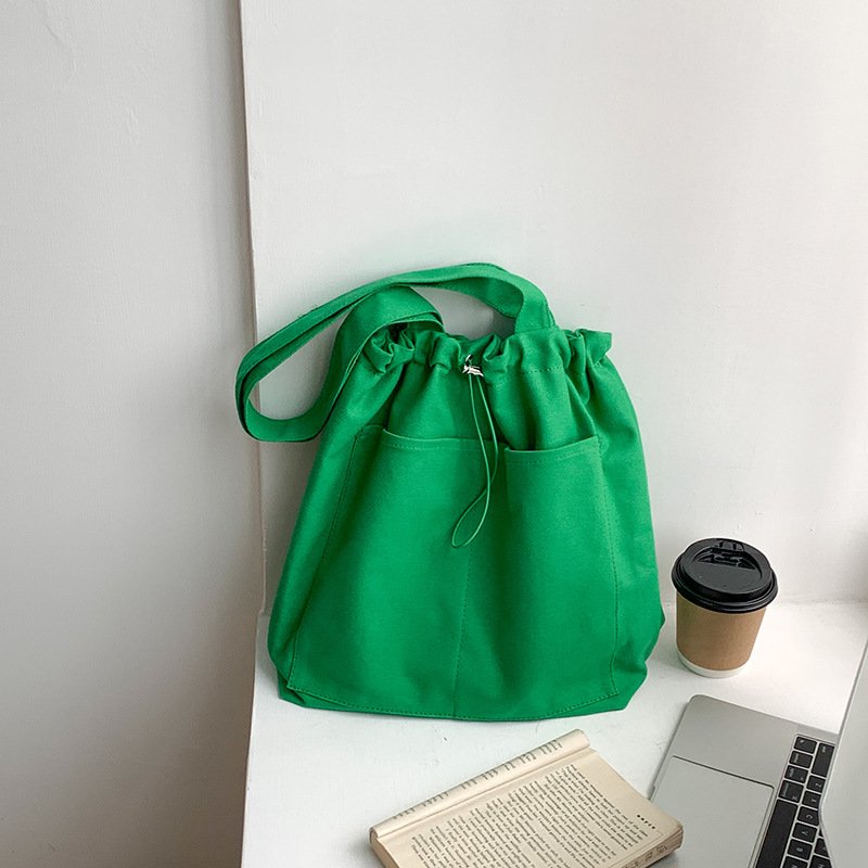 Korean version of the trend ins shoulder bag female casual canvas bag wholesale large capacity fold design Tote bag