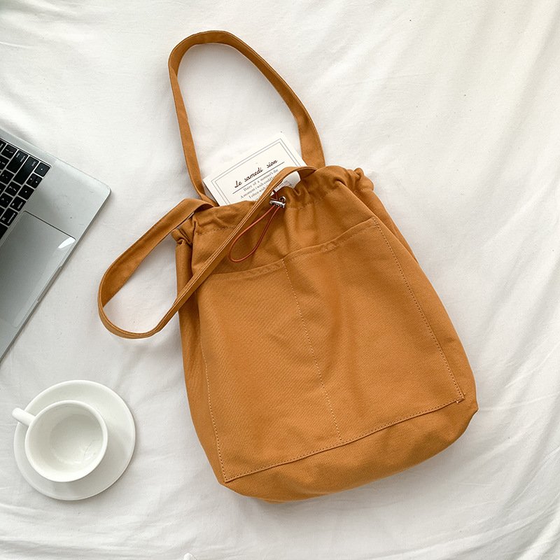 Korean version of the trend ins shoulder bag female casual canvas bag wholesale large capacity fold design Tote bag