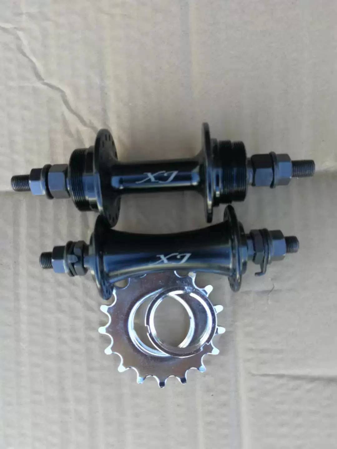 Factory direct sales XJ brand really die 32 holes, big ear, small ears and ear loose beads ride flowers drums