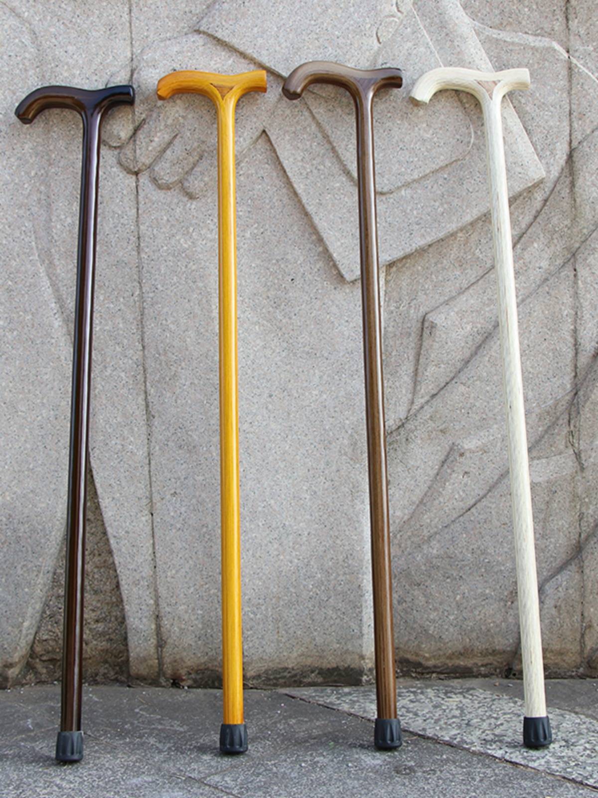The new elderly crutches integrated solid wood rumors The elderly cane is light and anti -slip column hand stick wood quality aid crutch