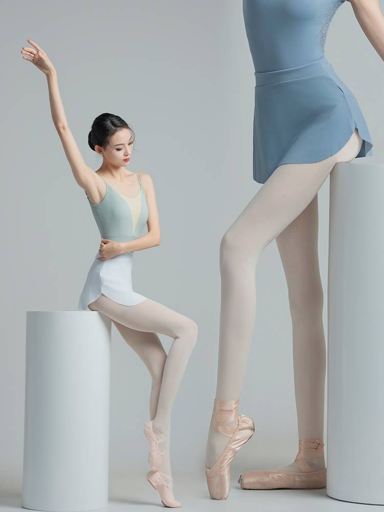 The adult ballerina is half-tied, short-dressed, dance-dressed