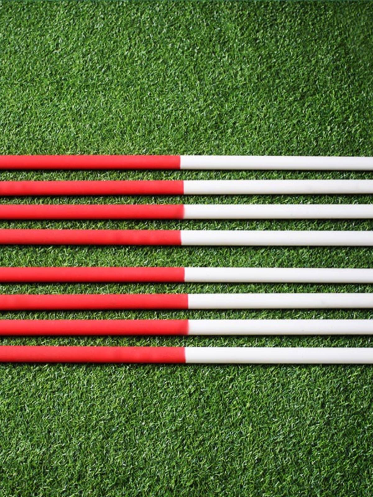 GYMNASIUM RODS AND TRACK TRAINING AIDS, RED AND WHITE ABS GYMNASTS AND PLASTIC STICKS