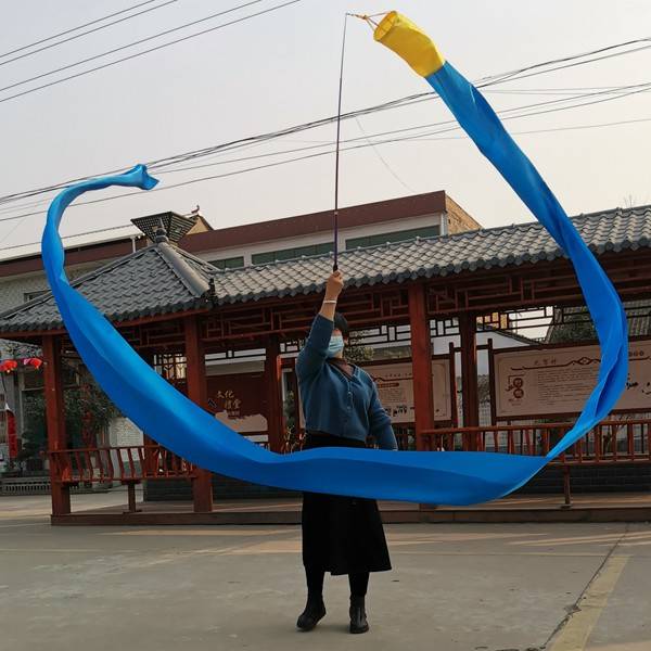 One + one blue silk, six metres long and 20 centimeters wide
