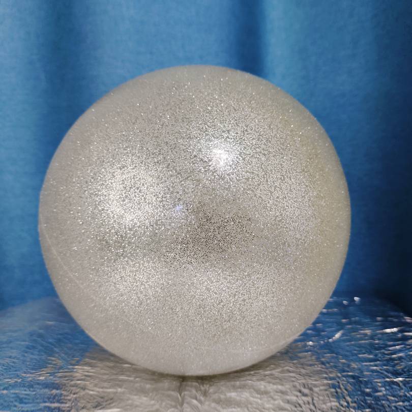 18 cm in diameter and silver