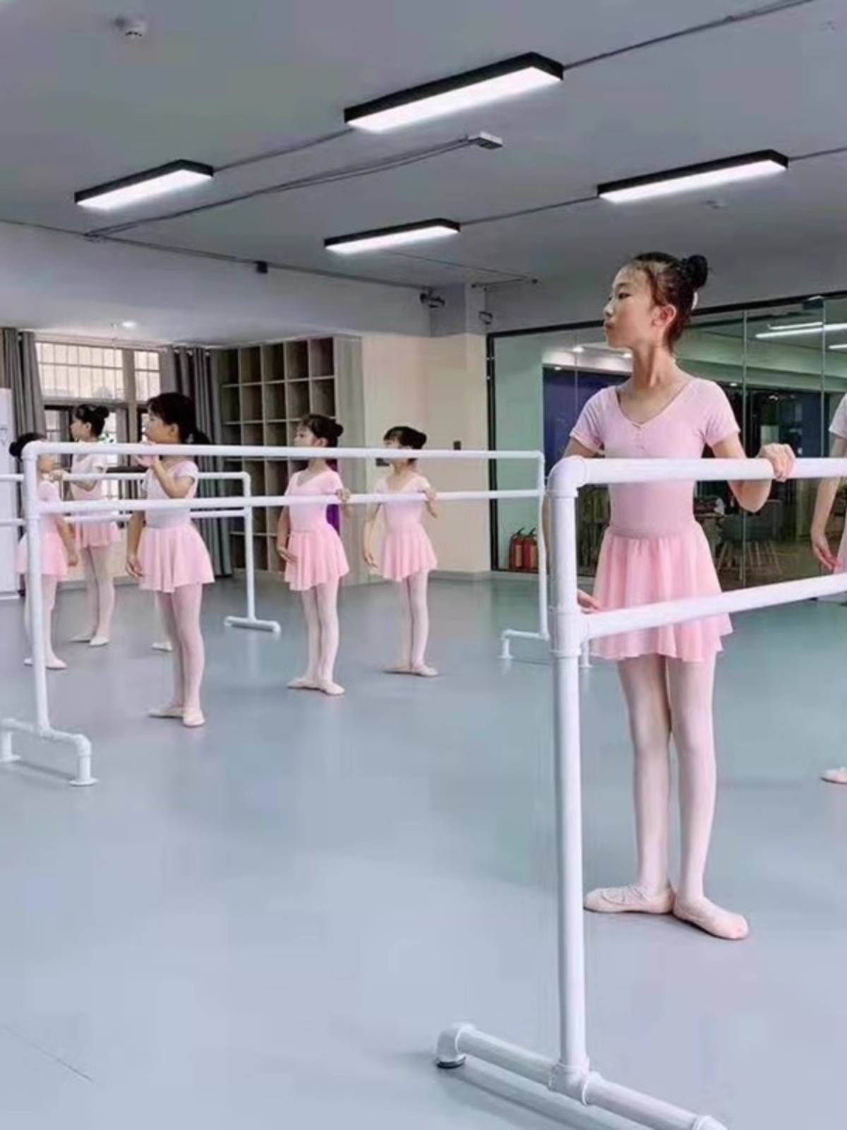 Mobile choreographers with a child-rided dance studio specializing in leg-stamping