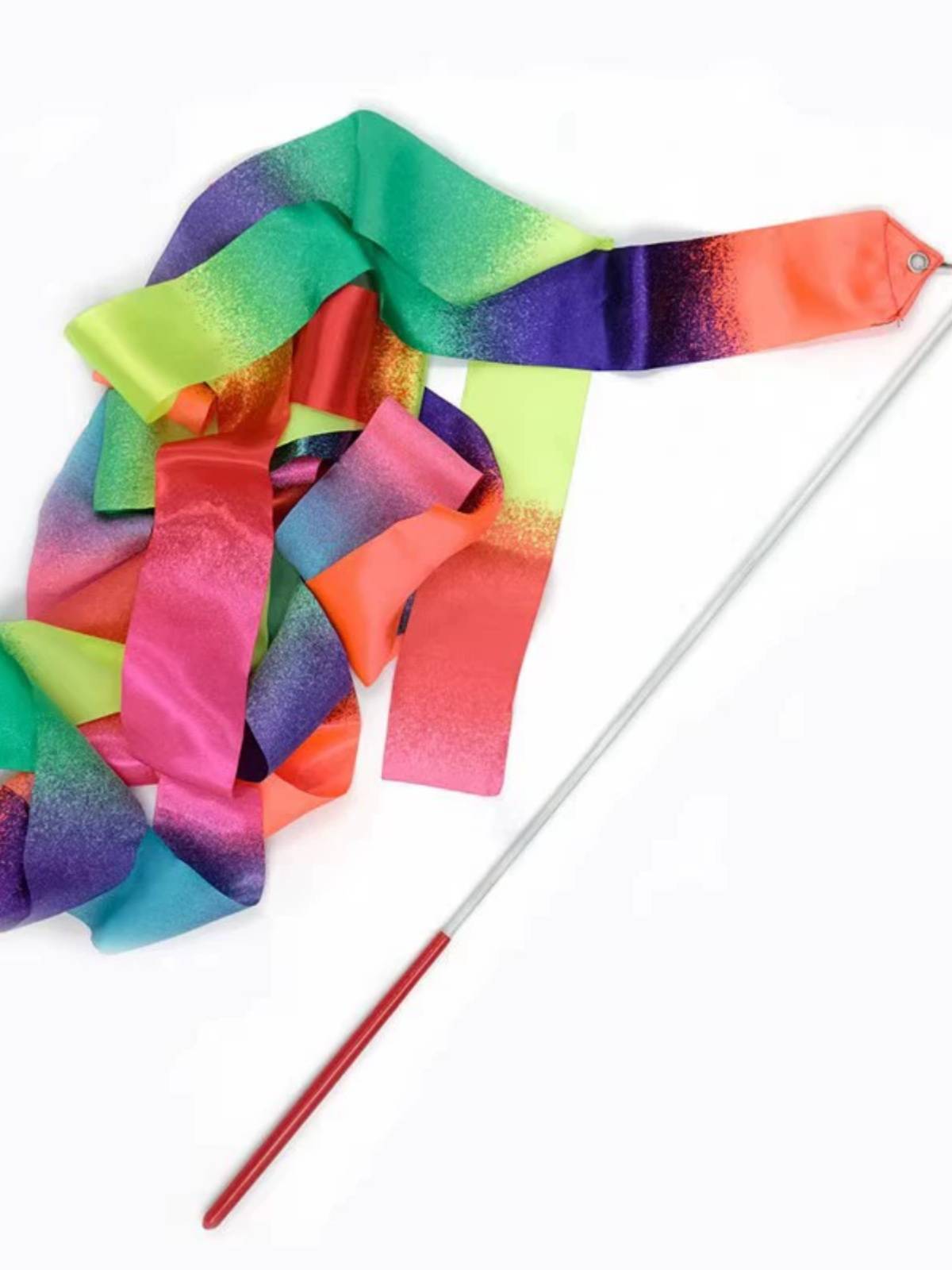 Promising gymnasium choreographer dances with sparkling silk and a professional ribbon with poles for adult children's stage shows