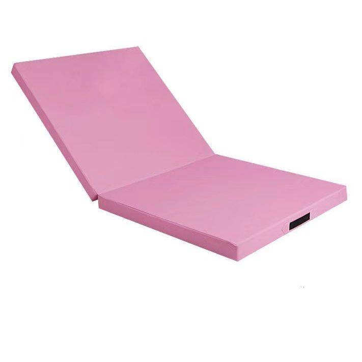 Primary school students stand up to sit on the sitting cushion dance pads folding gymnastics pads up and sit on empty and flip the pad to thicken children