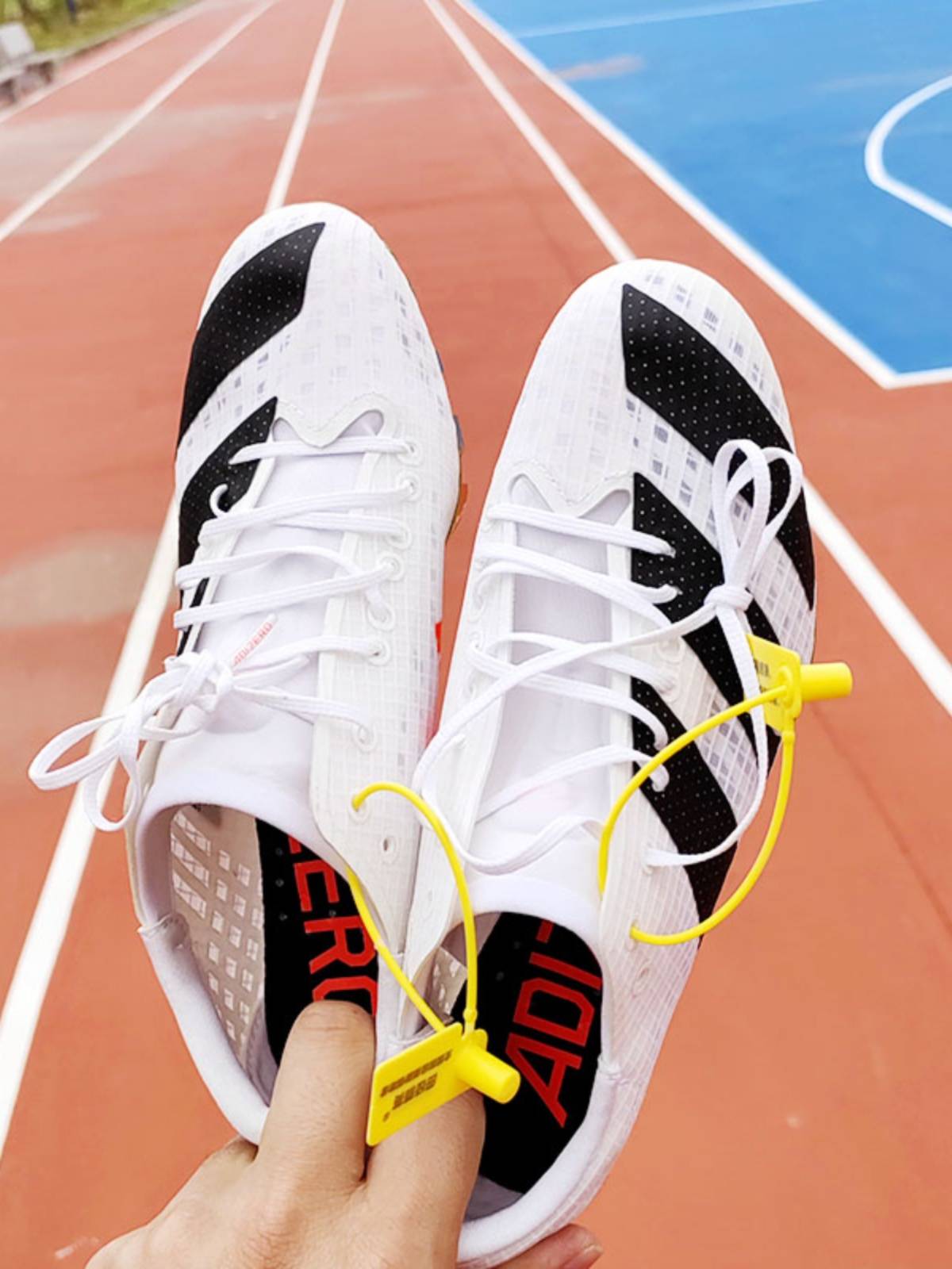 Little Cicada Wing Track and Field Elite Nail Shoes Men's Women's Professional Examination Four running high jumps, long jumping nail shoes competition training