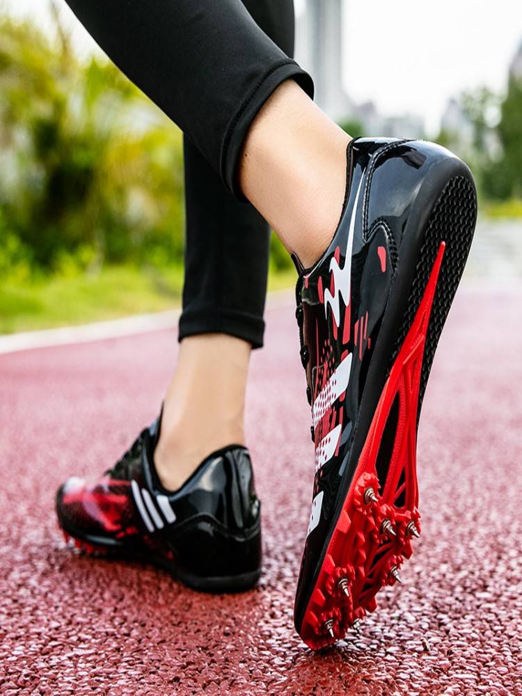 Two -star nail shoes track and field sprint male nail shoes female professional track and field shoes students jump sports on the sports middle school entrance examination seven nails