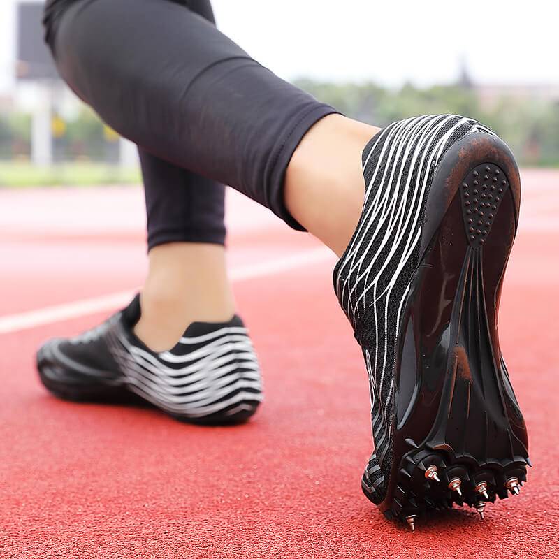New nail shoes, 100 -meter track and field male and female student mid -length running long shoes jumping shoes professional carbon board nail shoes