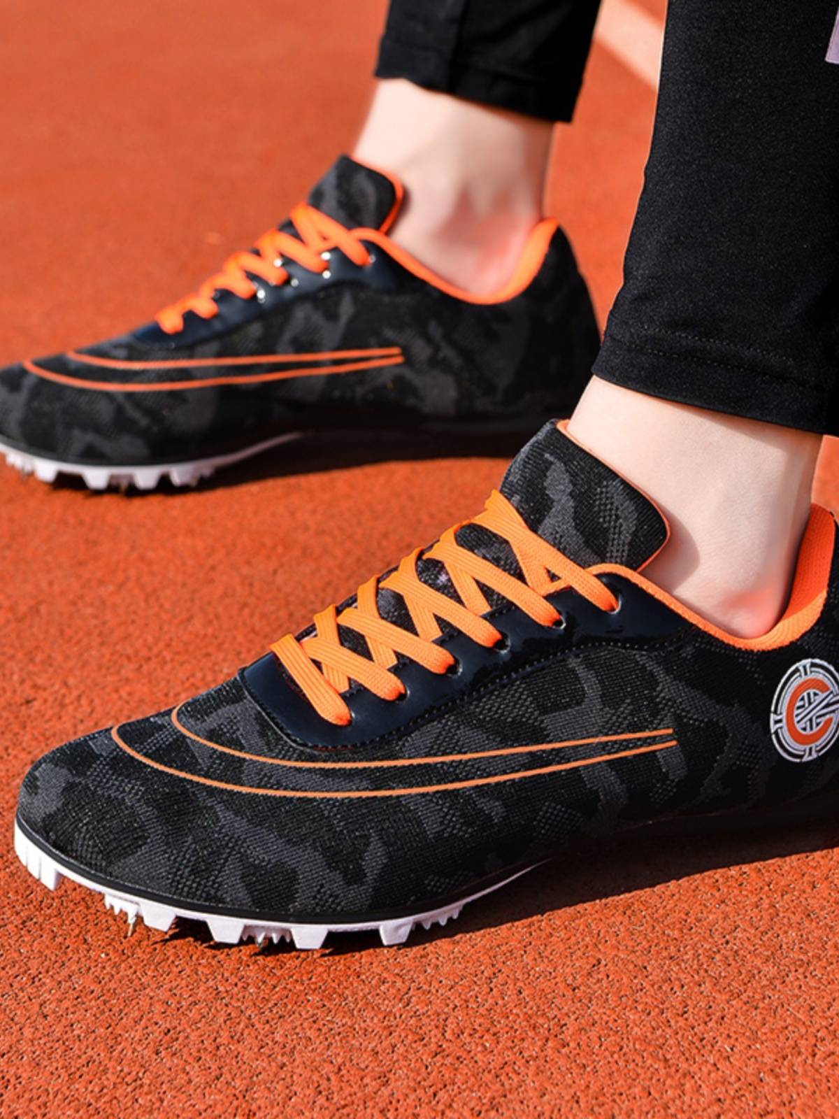 Adding points Speed up professional seven -nail shoes, track and field sprint training, male and female students running long -distance non -slip nail shoes