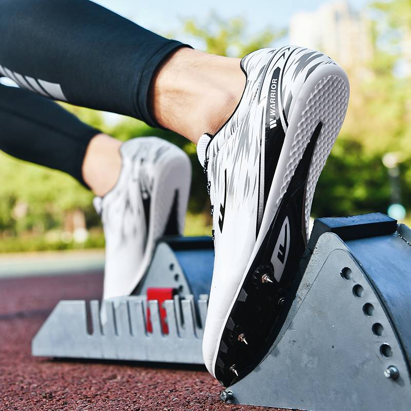 Back force track and field shoes mid -length sprint shoe track and field nail shoes men and female students physical test shoes jumping far -reaching training shoes