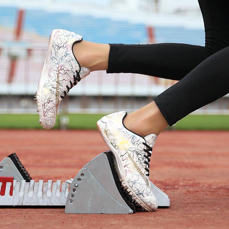 Foreign and Field Nail Shoes 50 -meter sprint men's shoes female 800 meters medium long running 8 nail jumping training physical examination competition shoes