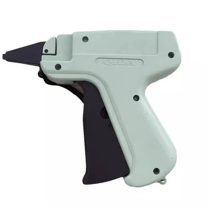 Tie tag label grabbering rubber guns fine needle hitting the trademark socks labeling machine quilt
