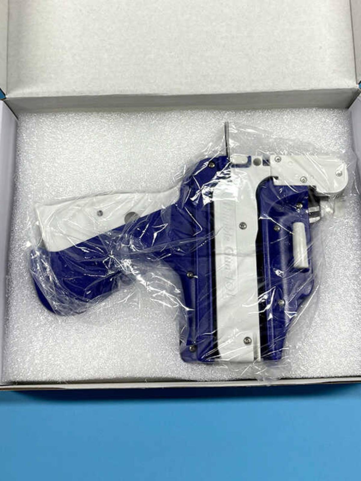 Circle gun tag gun Tag label grab card gun automatic perforated rope machine hardware daily supplies child mother buckle gun