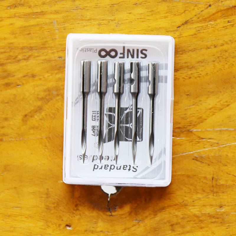 A box of imported carbon steel needles (5)