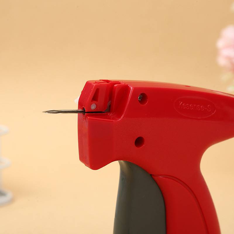 Red clothing fixed tag, shoe hak, socks, trademark, label gun thin needle, mother buckle rubber gun