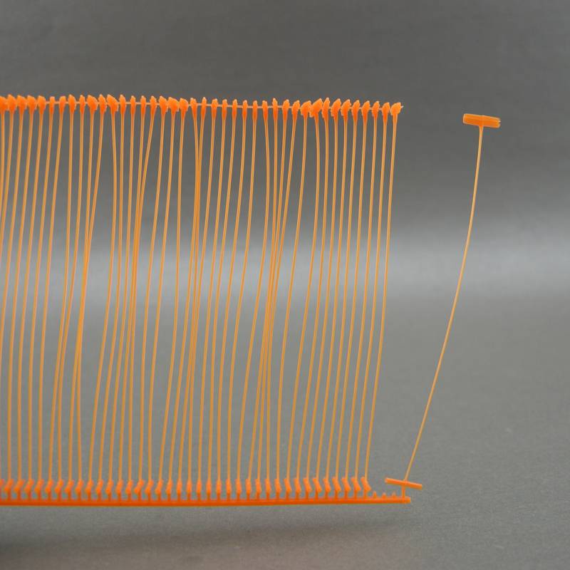 orange orange orange orange orange tag line rope tag, tag needle trademark gun needle plastic line