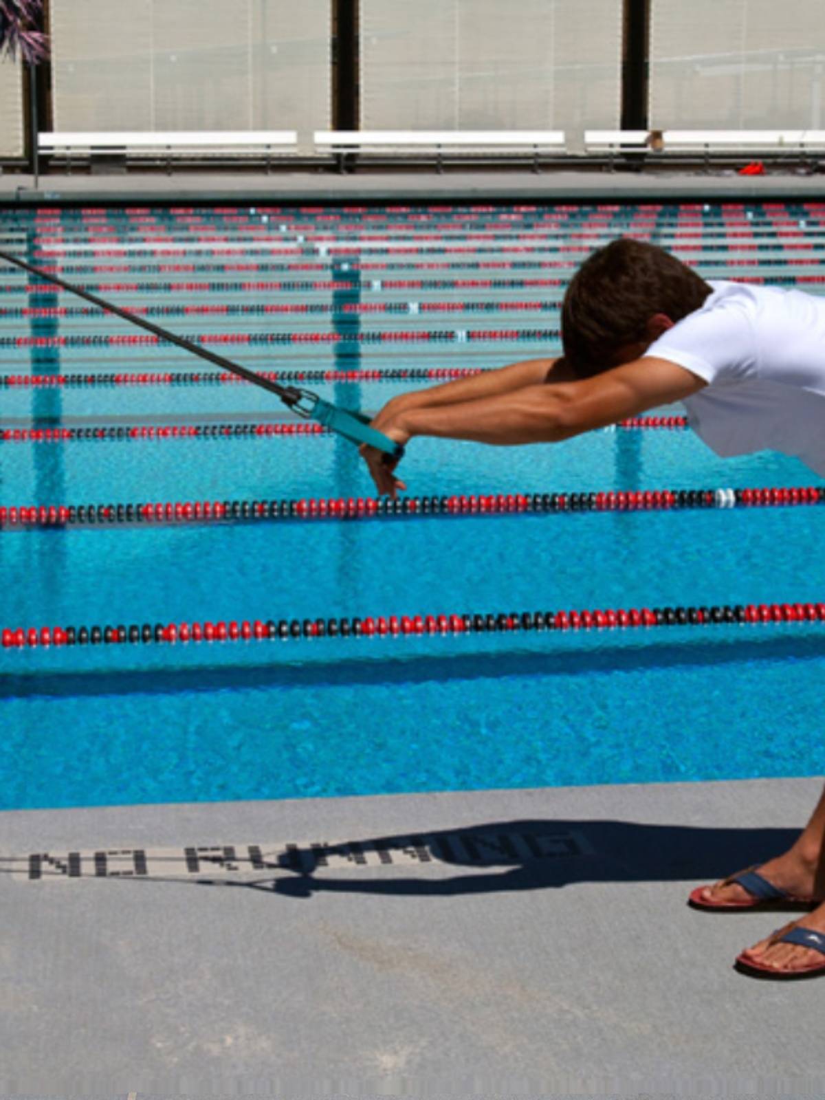 Land-based swimming pullers with pull ropes free-drive swim training for arm lifts