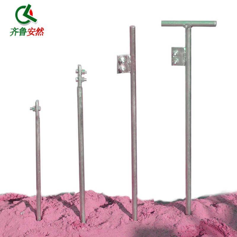 Zirouan lays a needle to the pole, a metre to the pole, and nails the pole to the surface, and lays a wire to the surface
