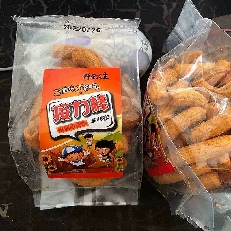 The relay rod fried rice cake bar kisses and spicy flavor over 25 minus 3 yuan net red small snacks Shandong hot sales